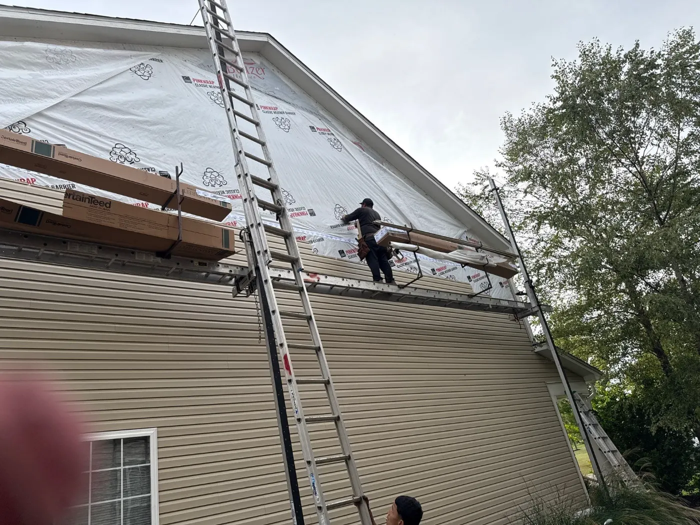 Storm-damaged siding documented in Traders Point